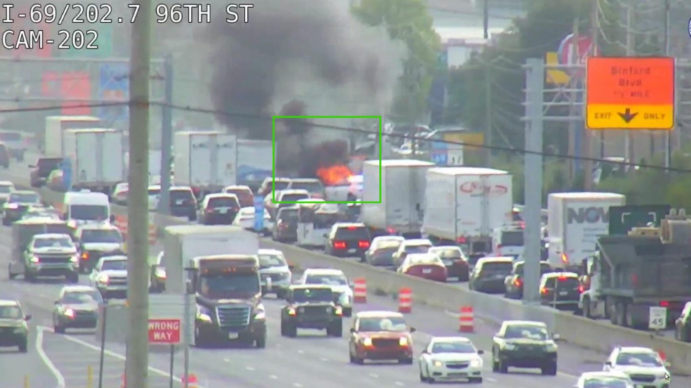 Traffic camera view of a roadway incident identified by Vision AI
