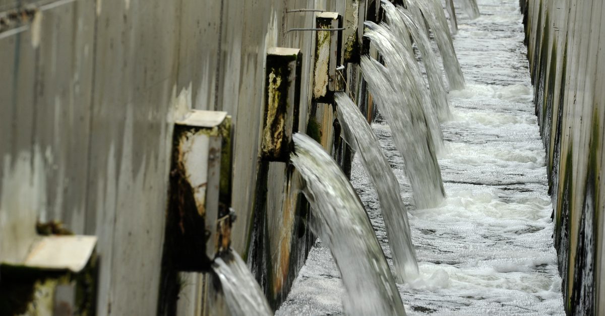 Pipes emptying at a wastewater facility