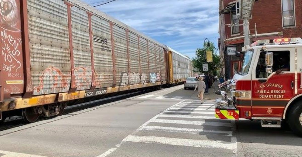 Fire truck blocked at an intersection by a train. Vision AI can help prevent this.
